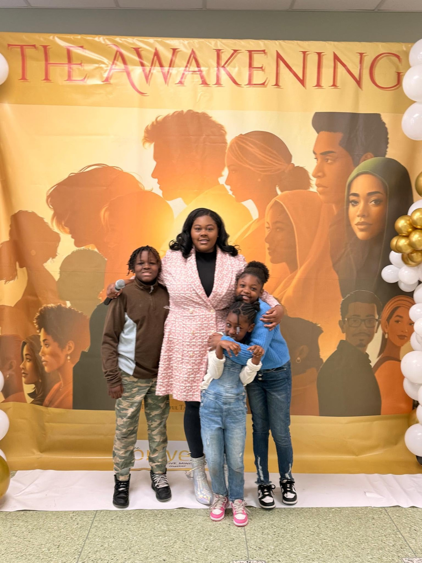 Jade with children at a community event