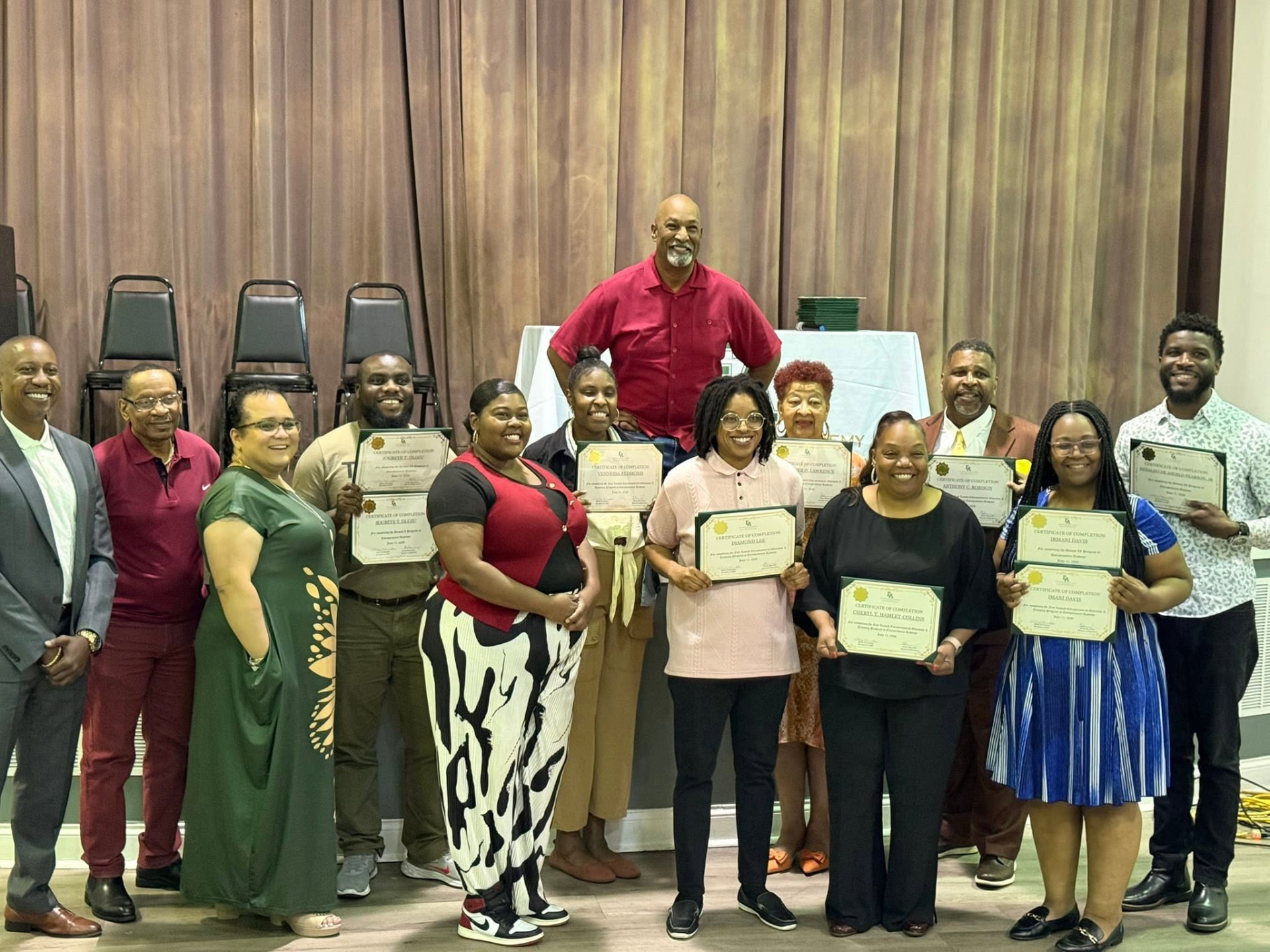 Jade with participants at a speaking event